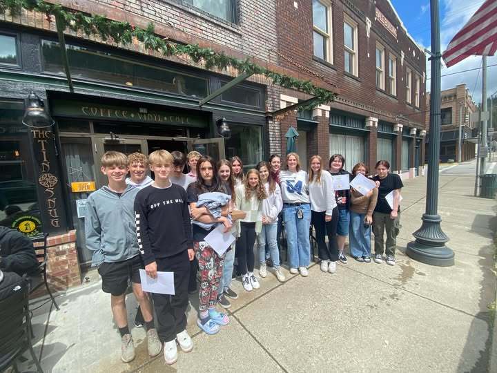 club members on sidewalk