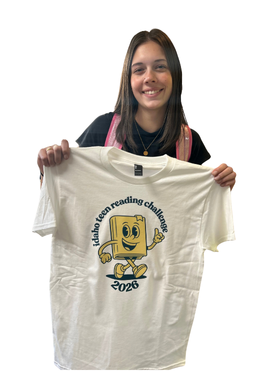 student holding ITRC t-shirt