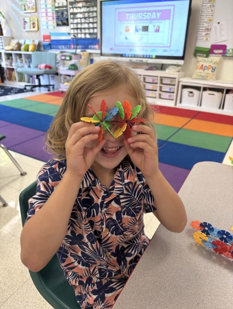 kindergarten student using brain flakes