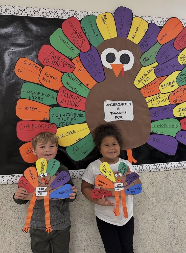 kindergarteners with their gratitude turkeys