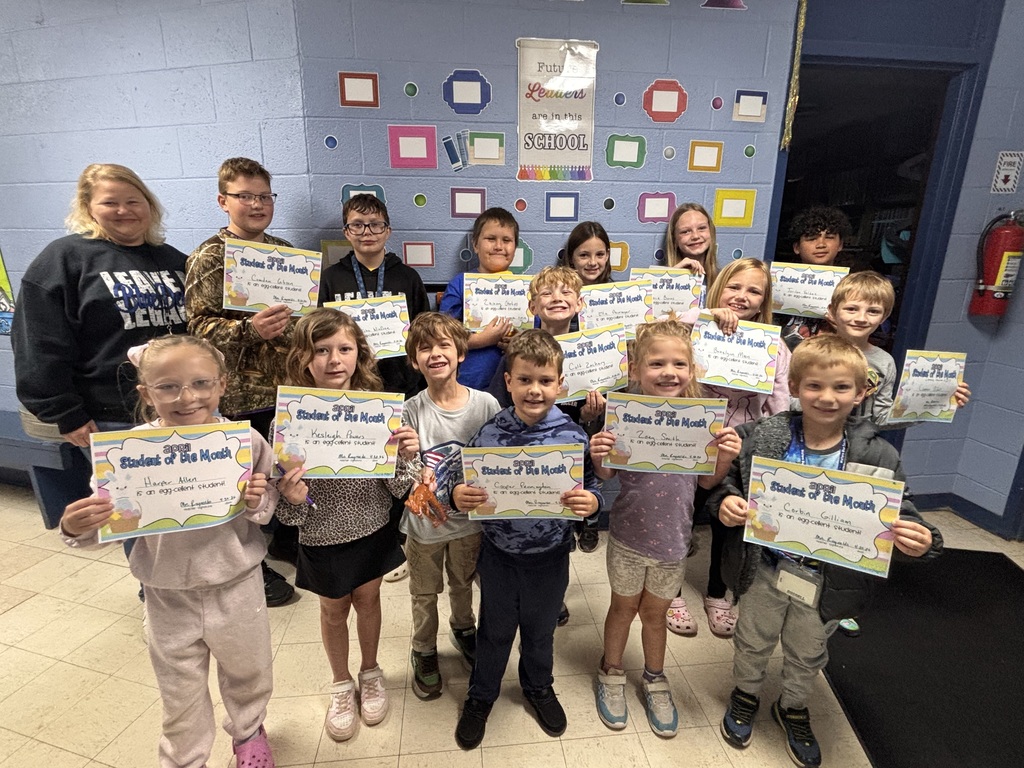 elementary students and teacher of the month for april