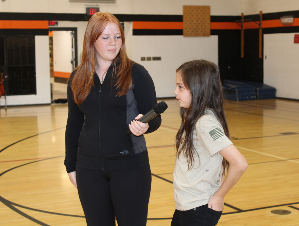 Students taking part in the middle school welcome back assembly
