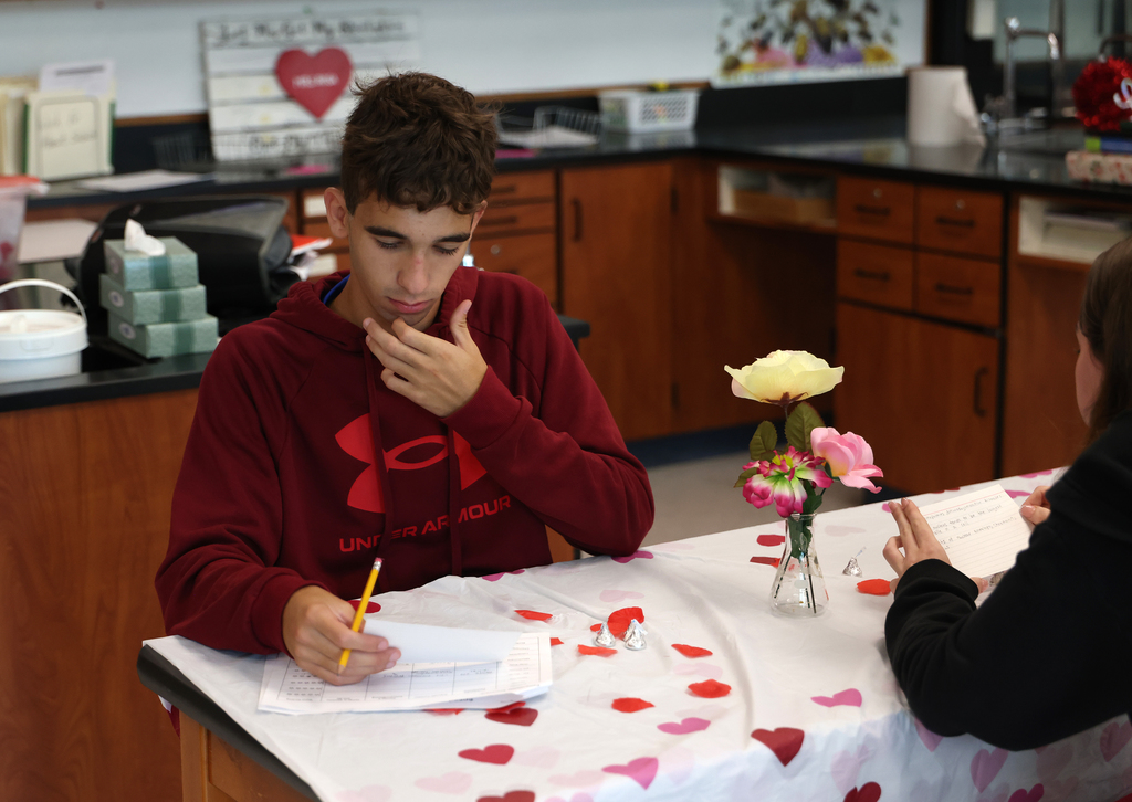 Students taking part in cellular organelle speed dating