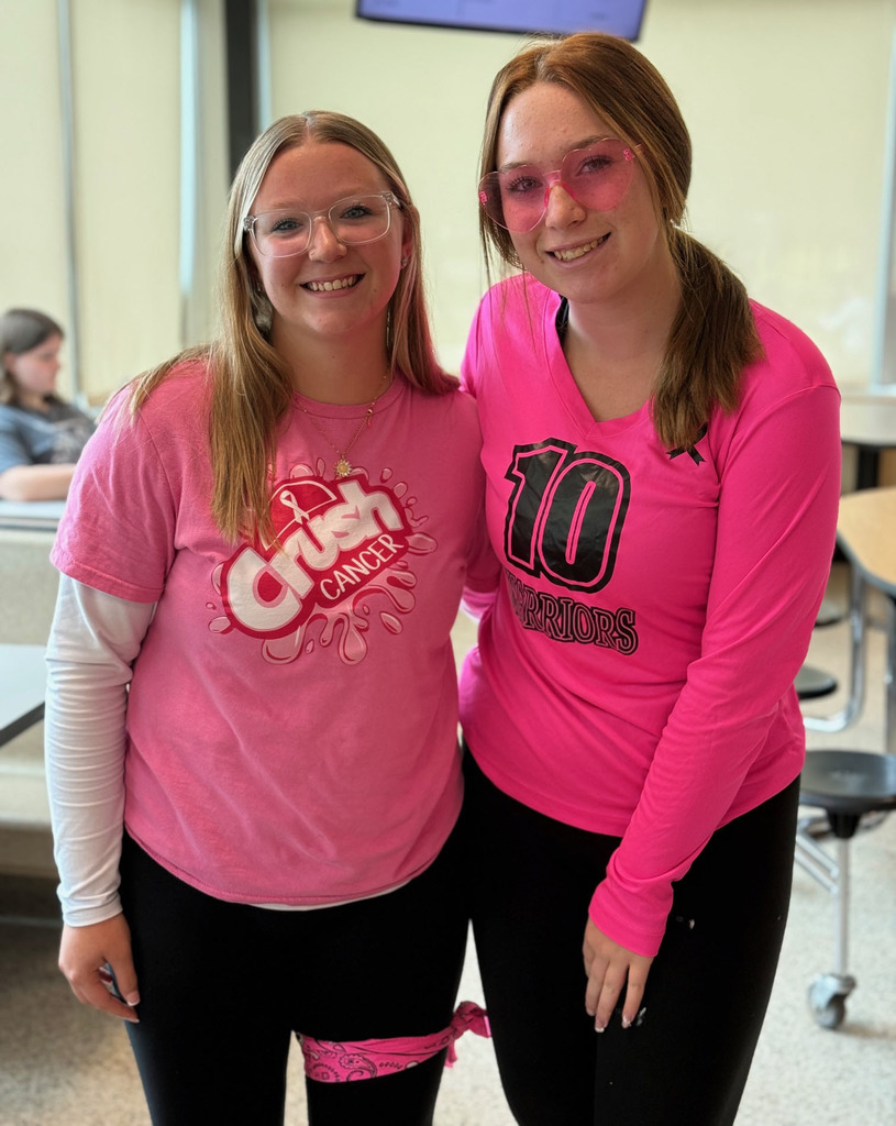 Students taking part in the Pink Out! day during spirit week.