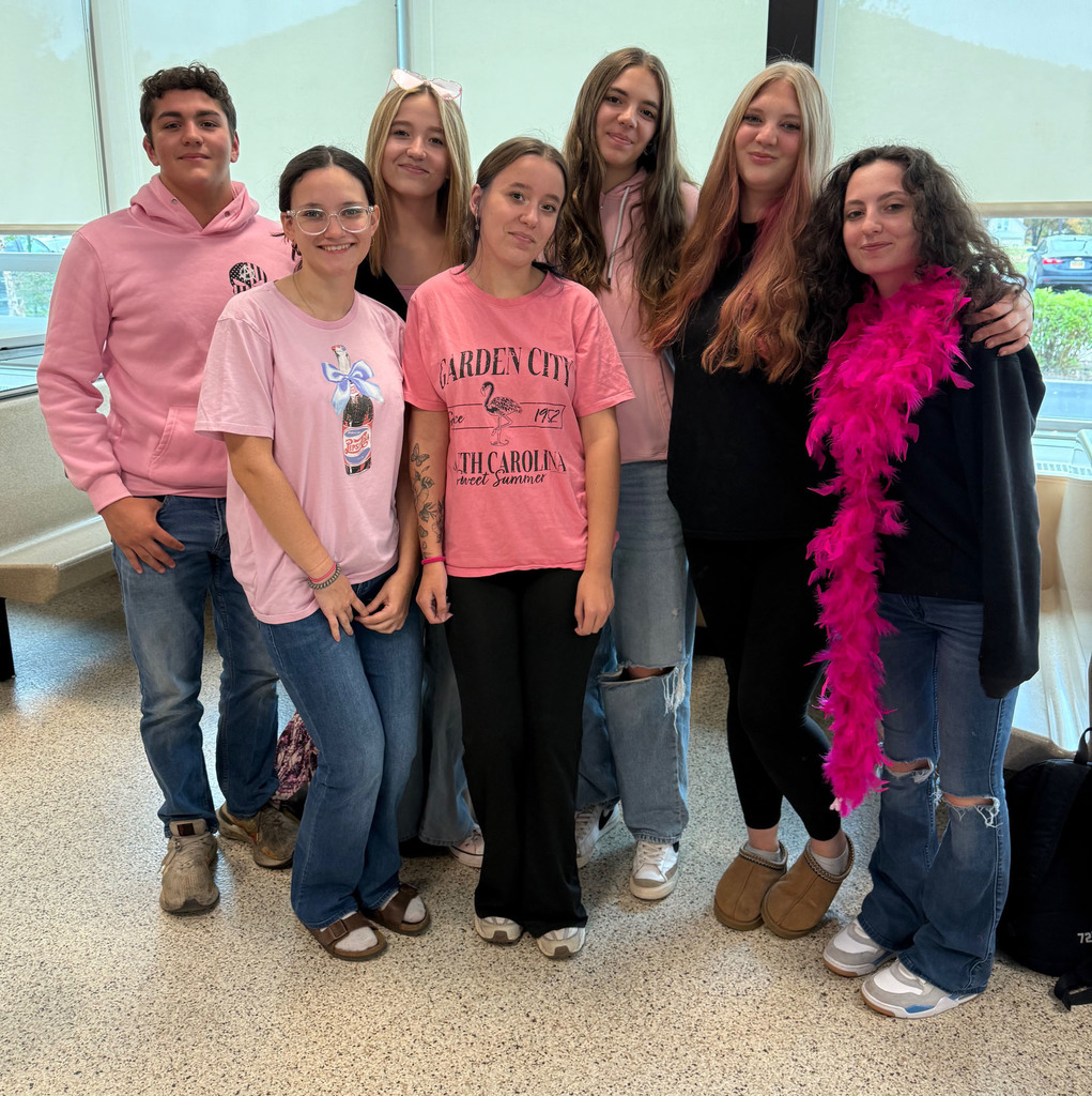Students taking part in the Pink Out! day during spirit week.