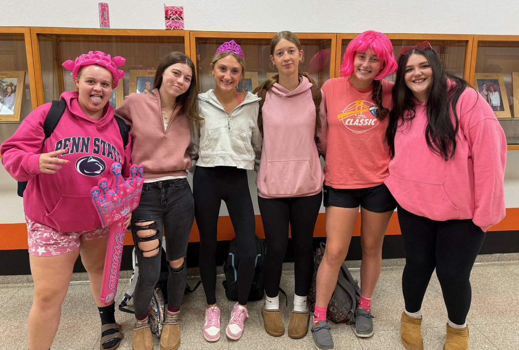 Students taking part in the Pink Out! day during spirit week.