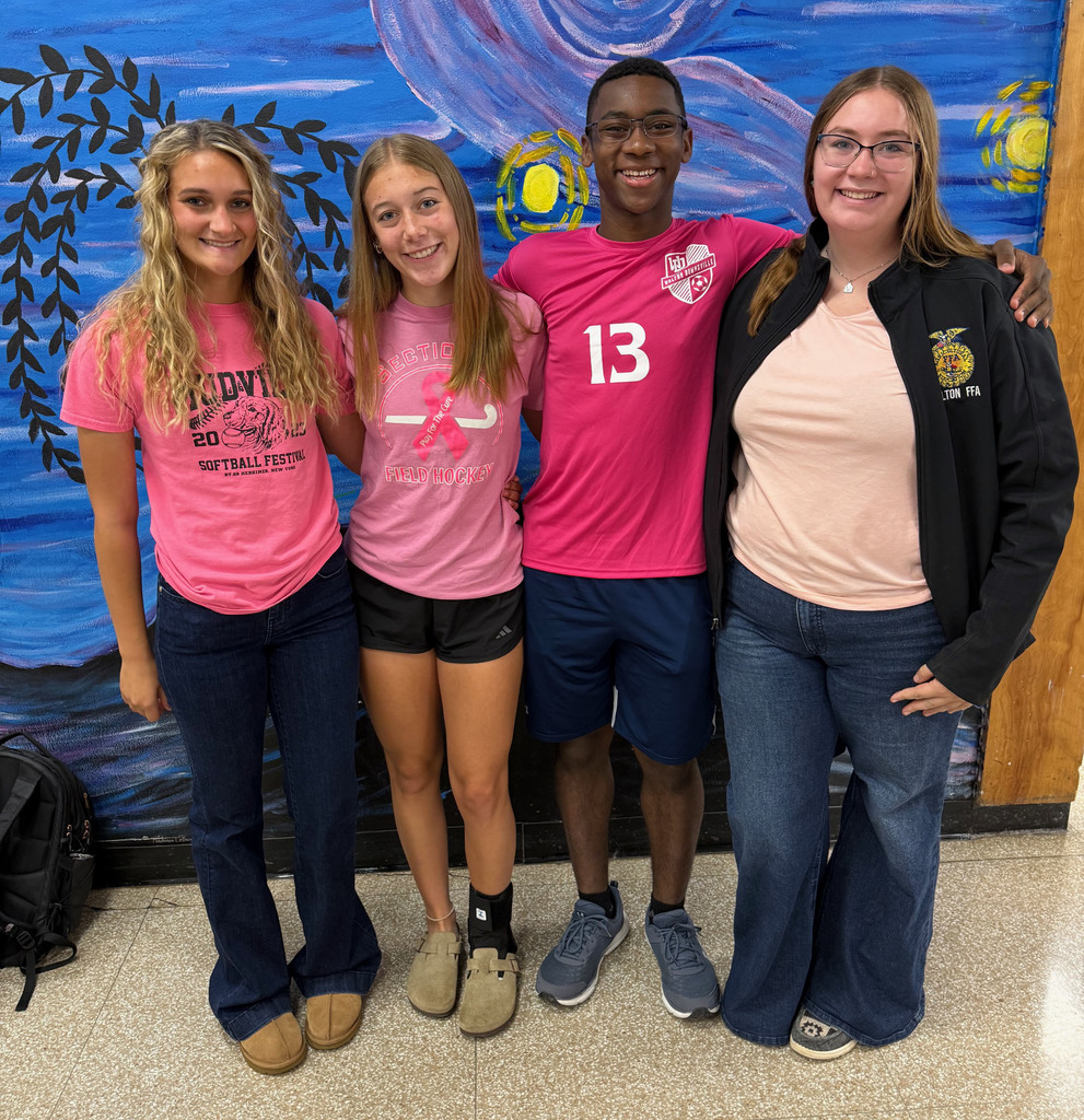 Students taking part in the Pink Out! day during spirit week.