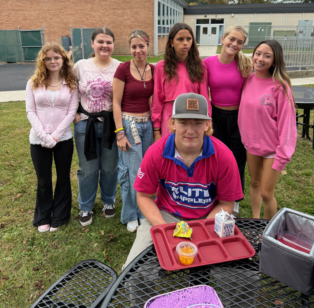 Students taking part in the Pink Out! day during spirit week.