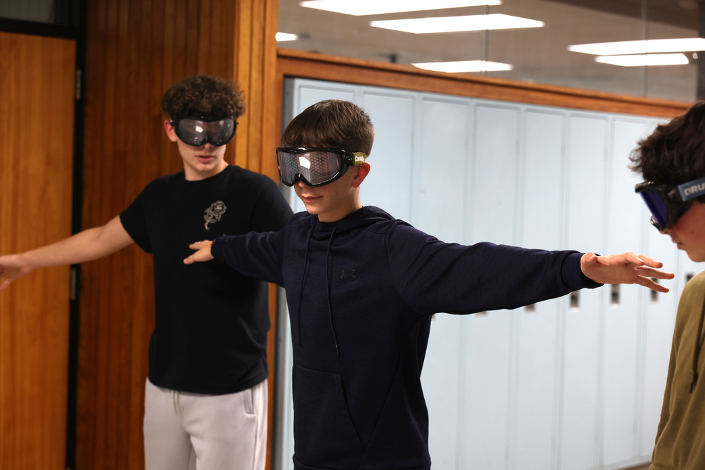 Students taking part in different stations during the health class lesson. 