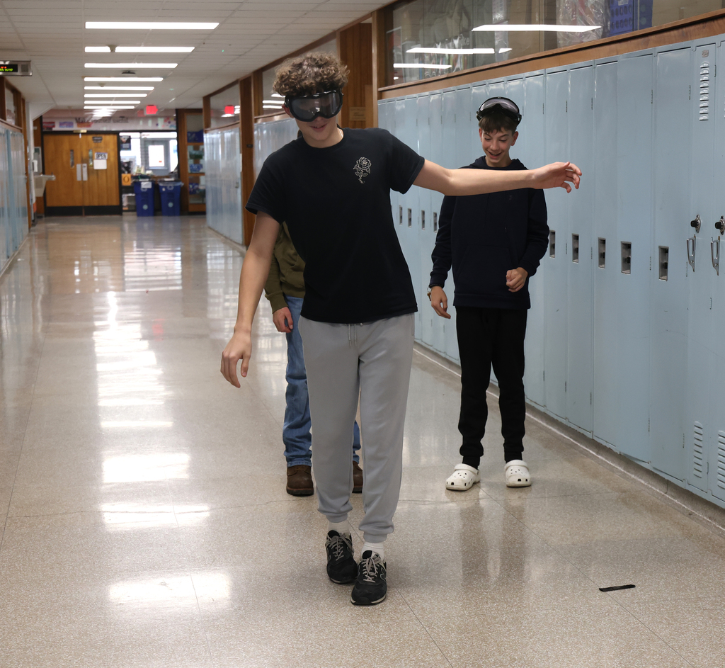 Students taking part in different stations during the health class lesson. 