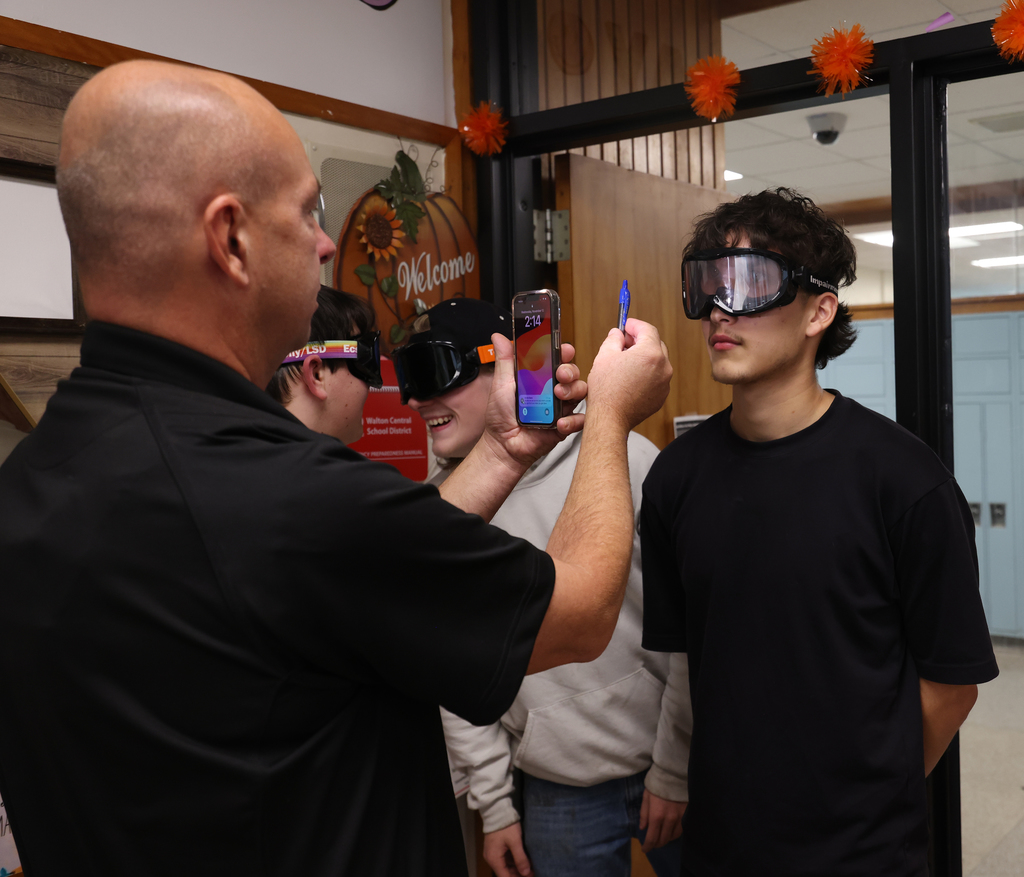 Students taking part in different stations during the health class lesson. 