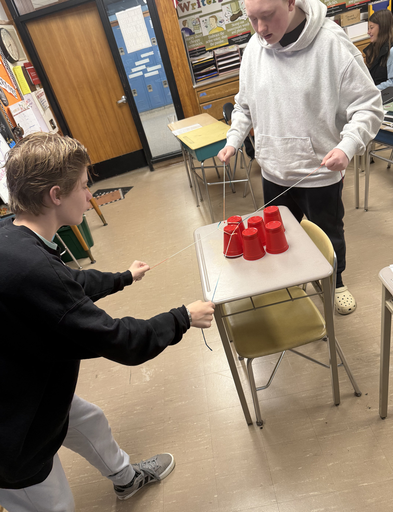 Students taking part in a team-building exercise.
