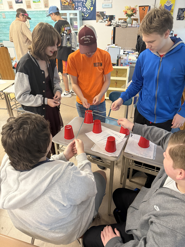 Students taking part in a team-building exercise.