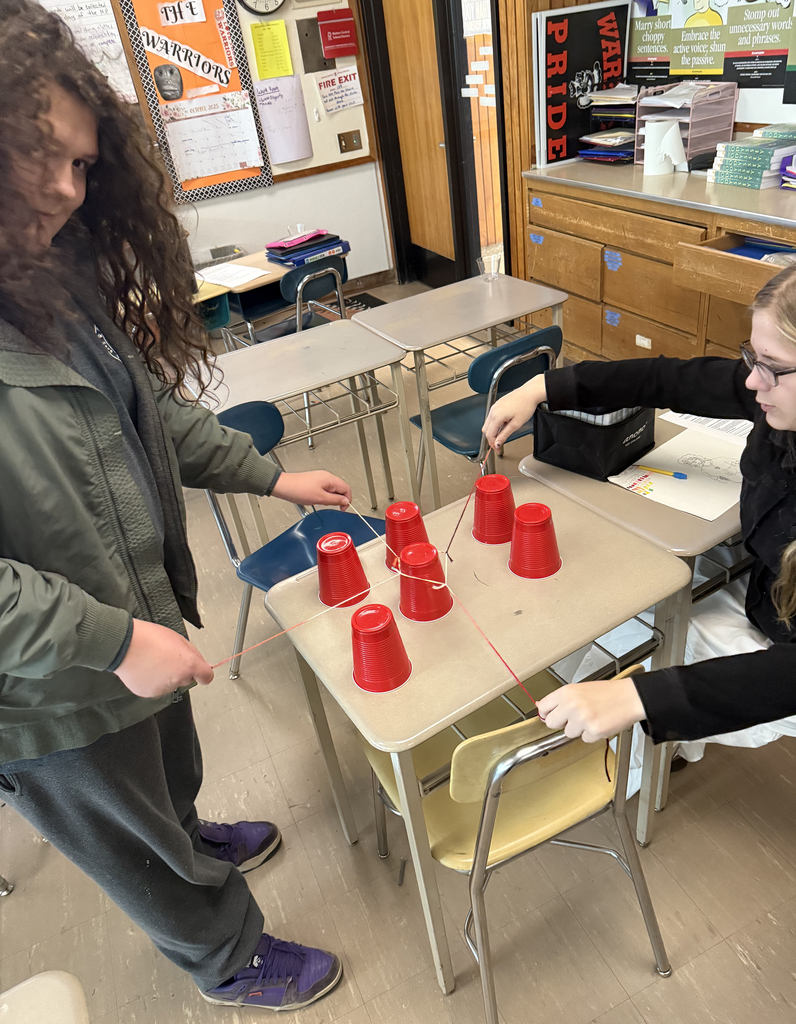 Students taking part in a team-building exercise.