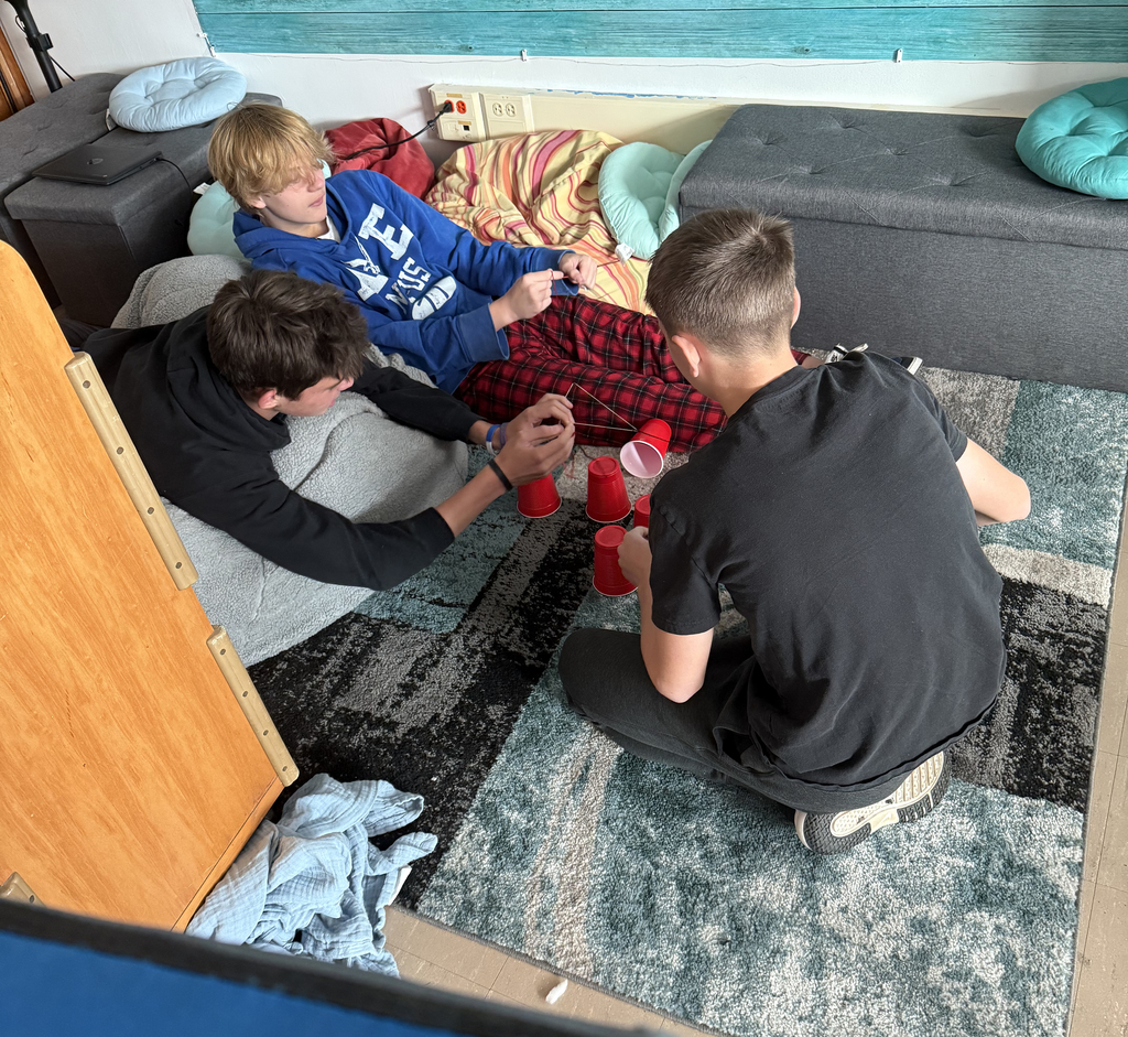 Students taking part in a team-building exercise.