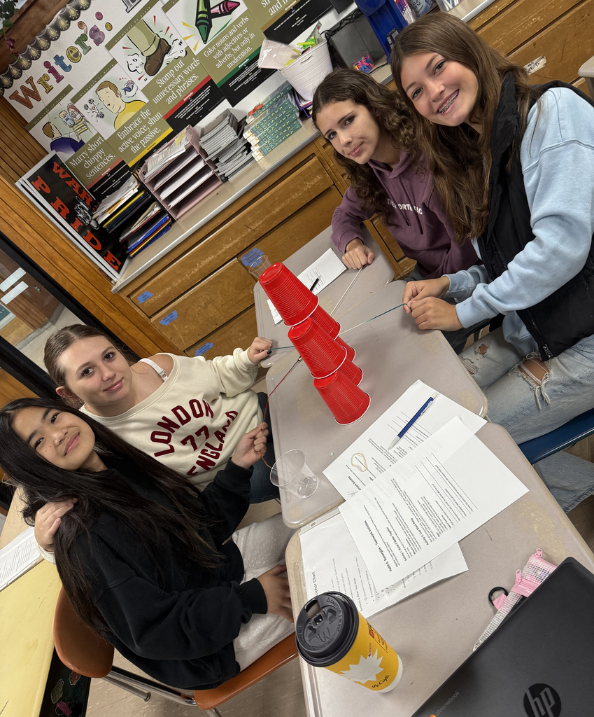 Students taking part in a team-building exercise.