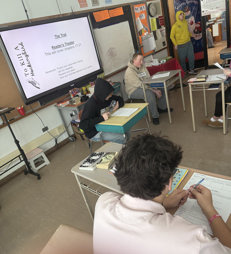 Students taking part in acting out a scene from "To Kill a Mockingbird." 