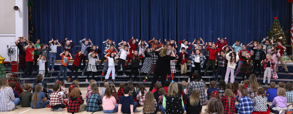 Students performing in front of peersStudents performing in front of peers