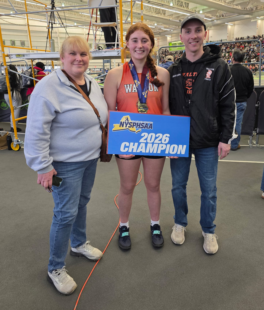 State champion Grace Walley with her mother and coach. 