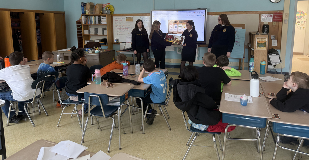 FFA/agriculture students speaking to elementary students