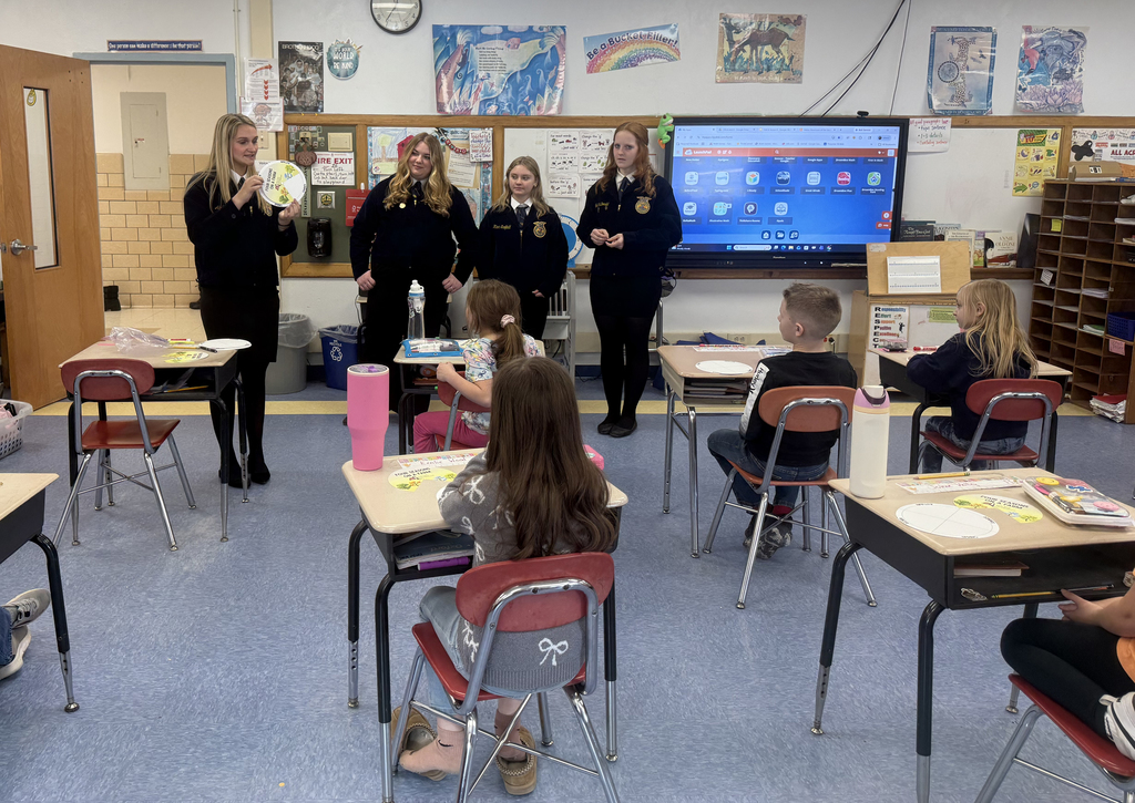 FFA/agriculture students speaking to elementary students