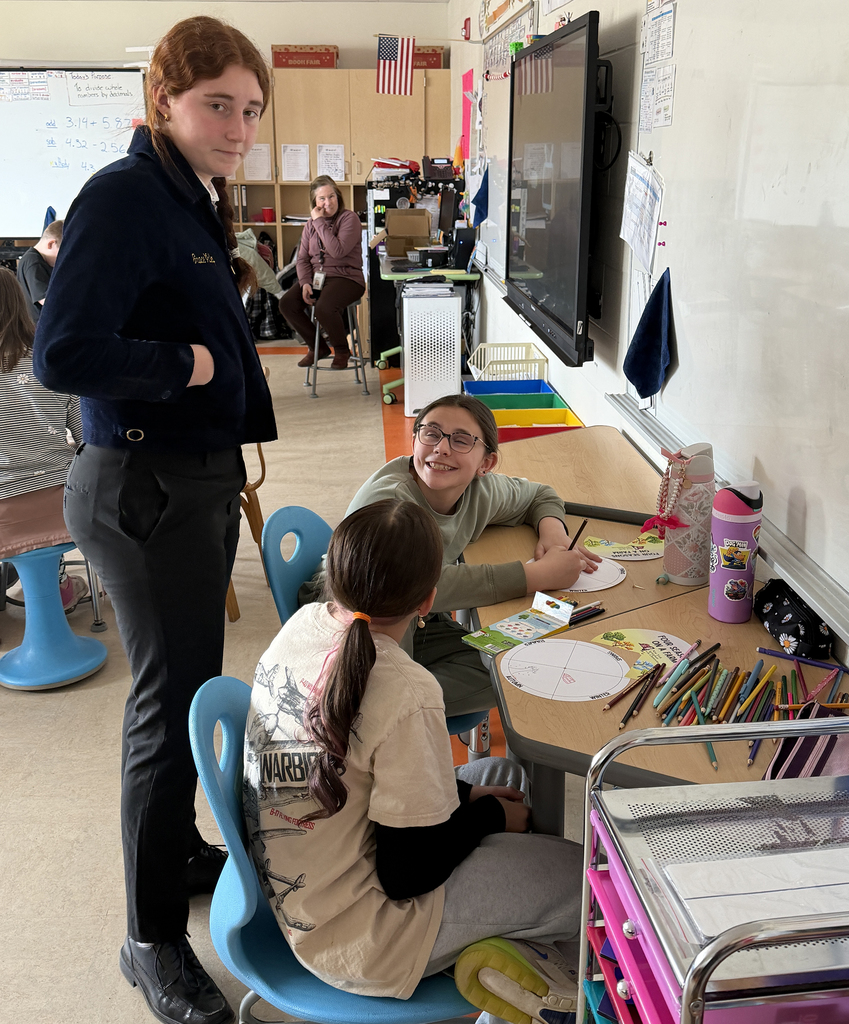 FFA/agriculture students speaking to elementary students