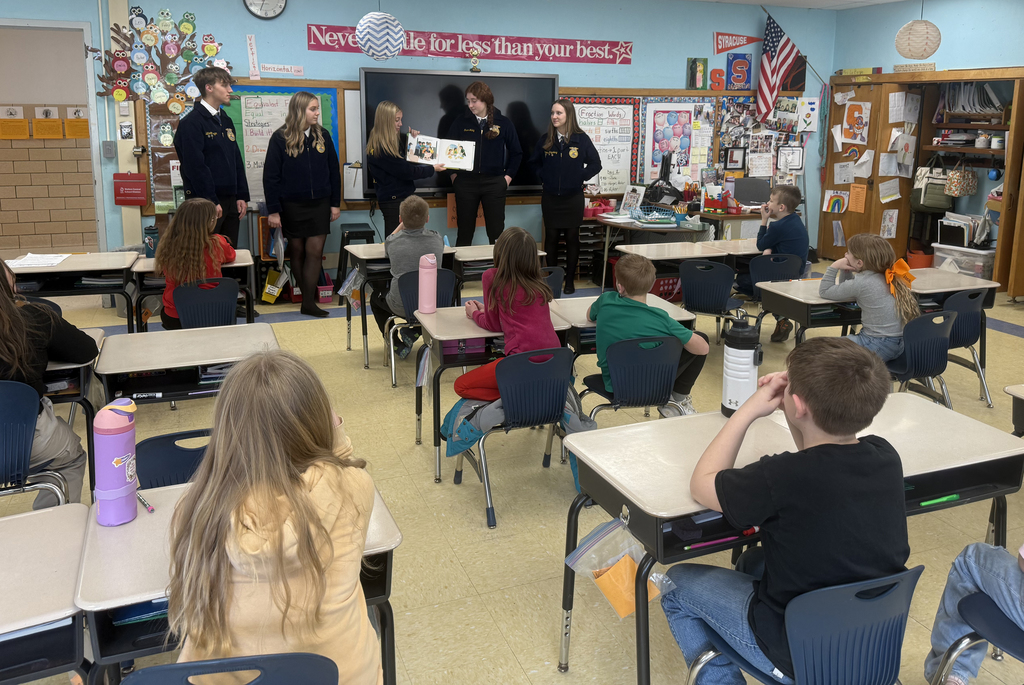 FFA/agriculture students speaking to elementary students
