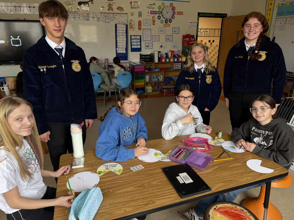 FFA/agriculture students speaking to elementary students