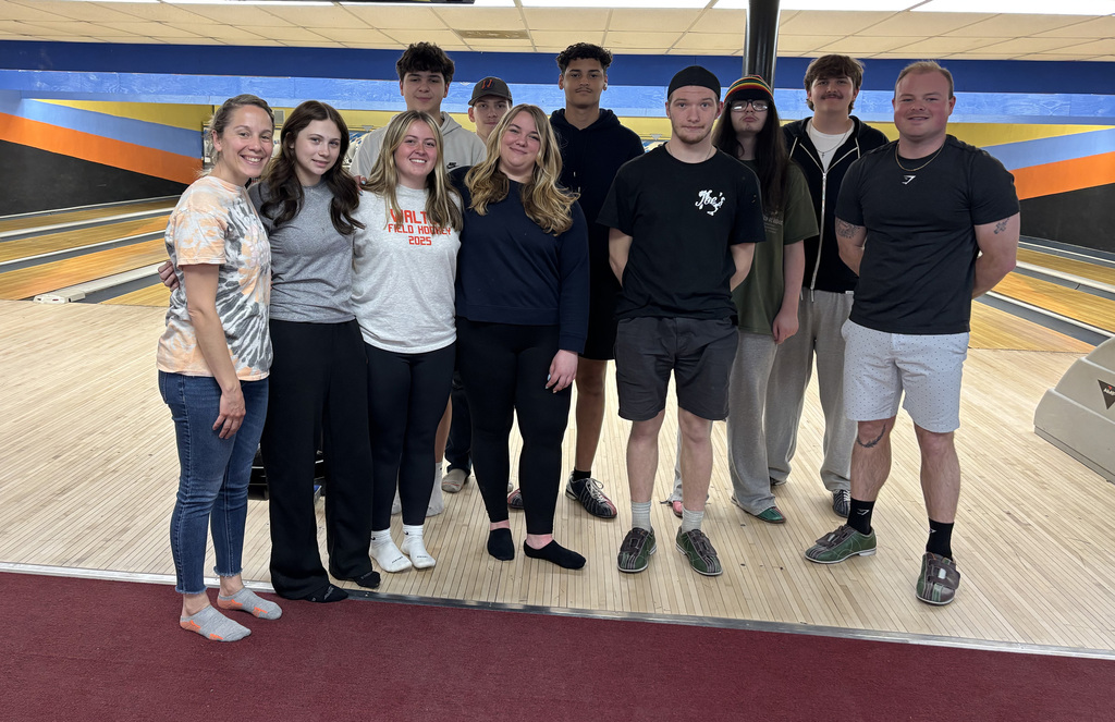 Group photo of students at bowling alley