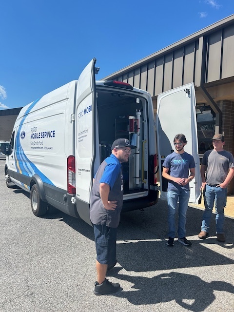 ECTC students explore Ford Mobile Van.
