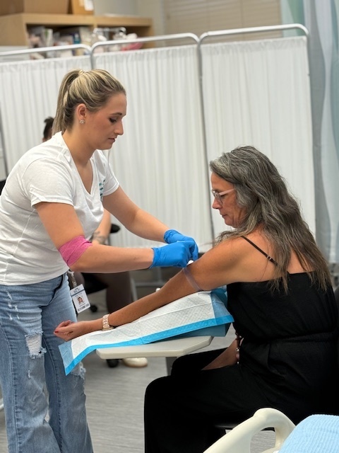 ECTC Phlebotomy students drawing blood for the first time! 