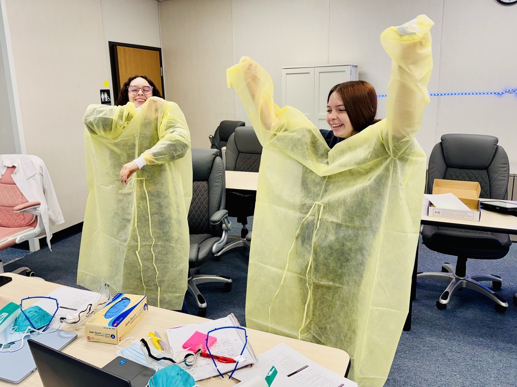 PCT students learning about PPE.