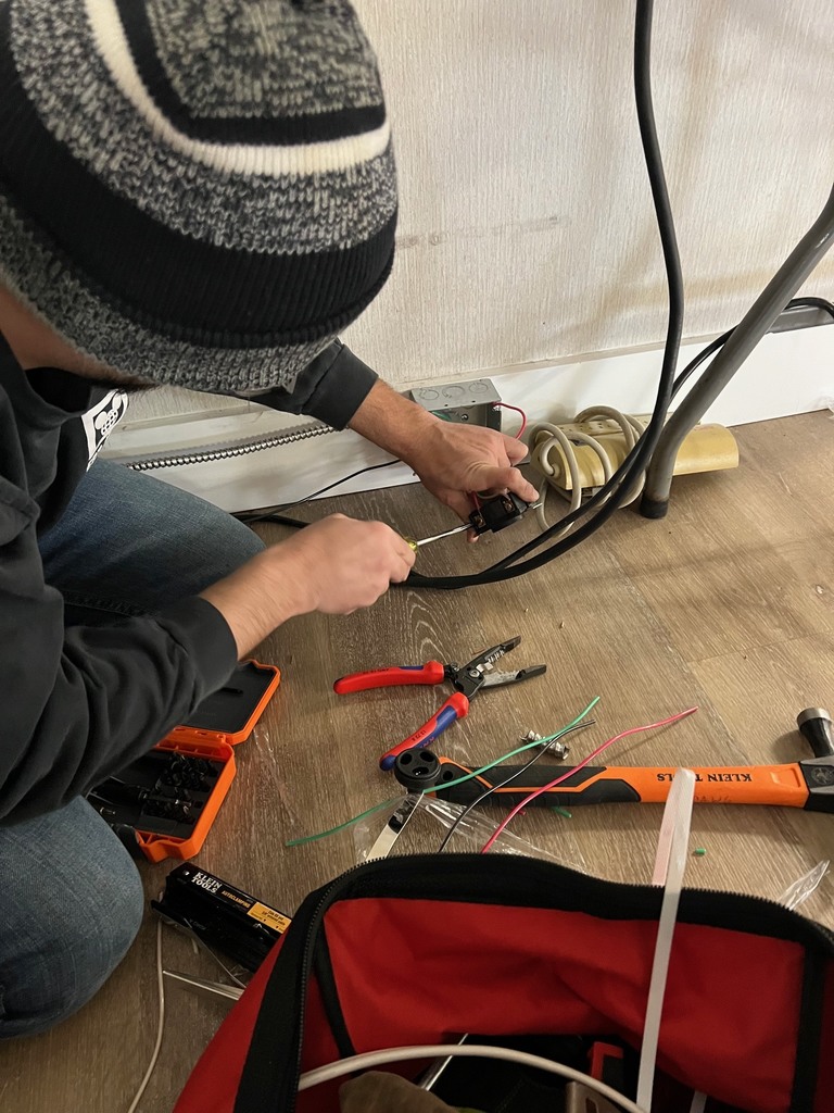 ECTC Electricity students working at The Academy.