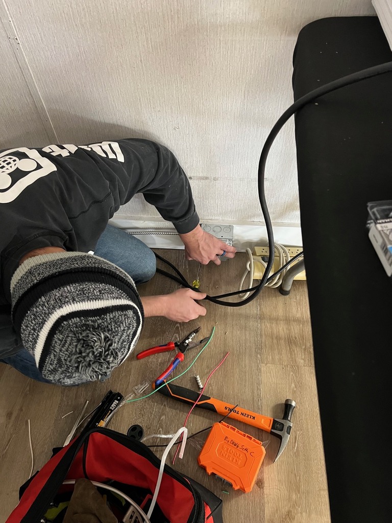 ECTC Electricity students working at The Academy.