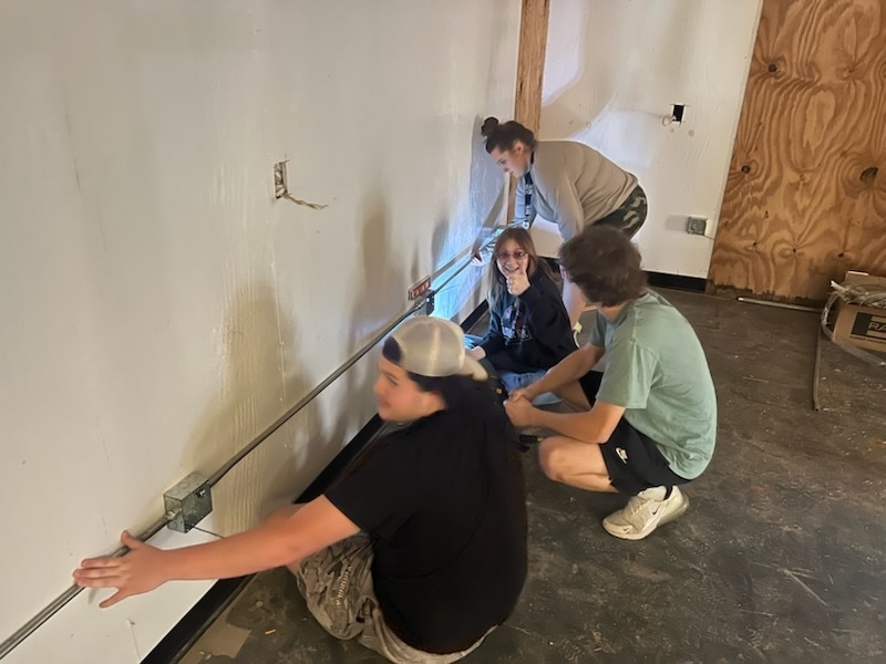 Electricity students at ECTC working in the community. 