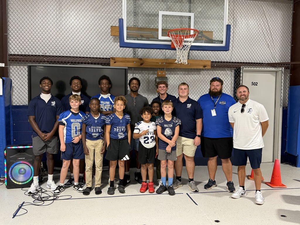 Glen coffee with students and coaches