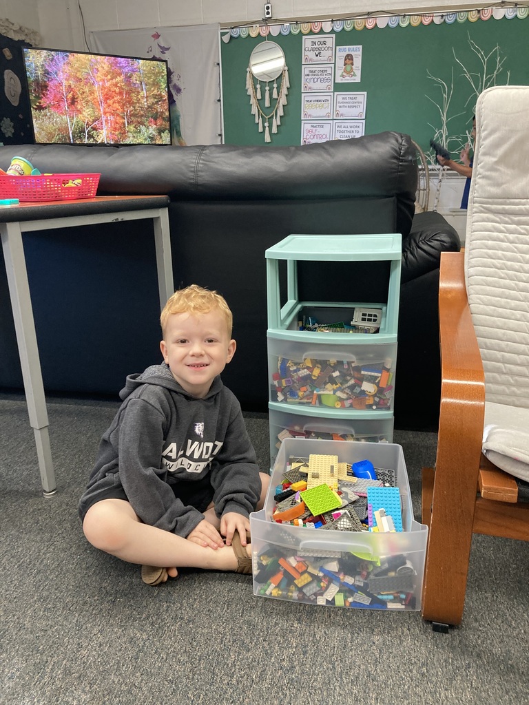 A student with Legos