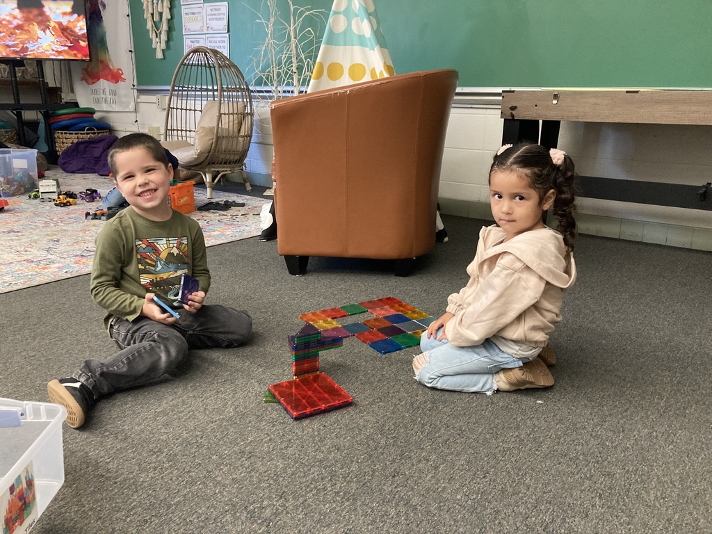 Students playing magnatiles