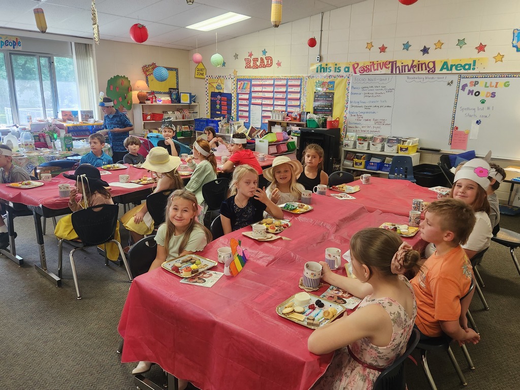 Students eating at the tea party.