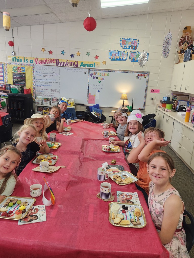 Students eating at the tea party.