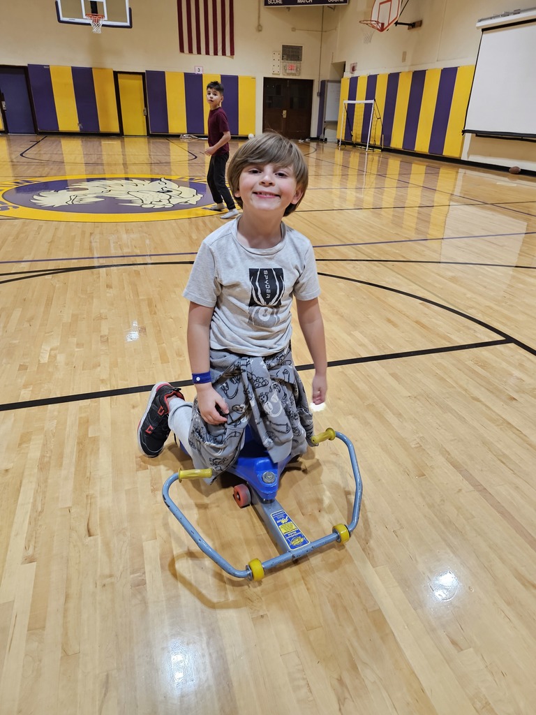 student on a scooter