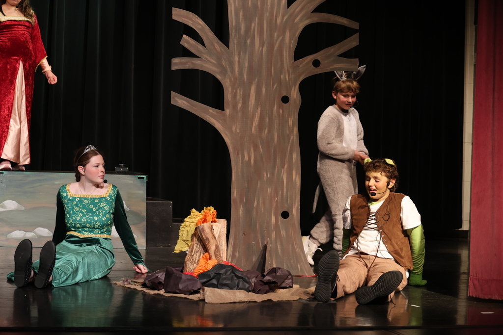 Fiona, Donkey, and Shrek by a tree