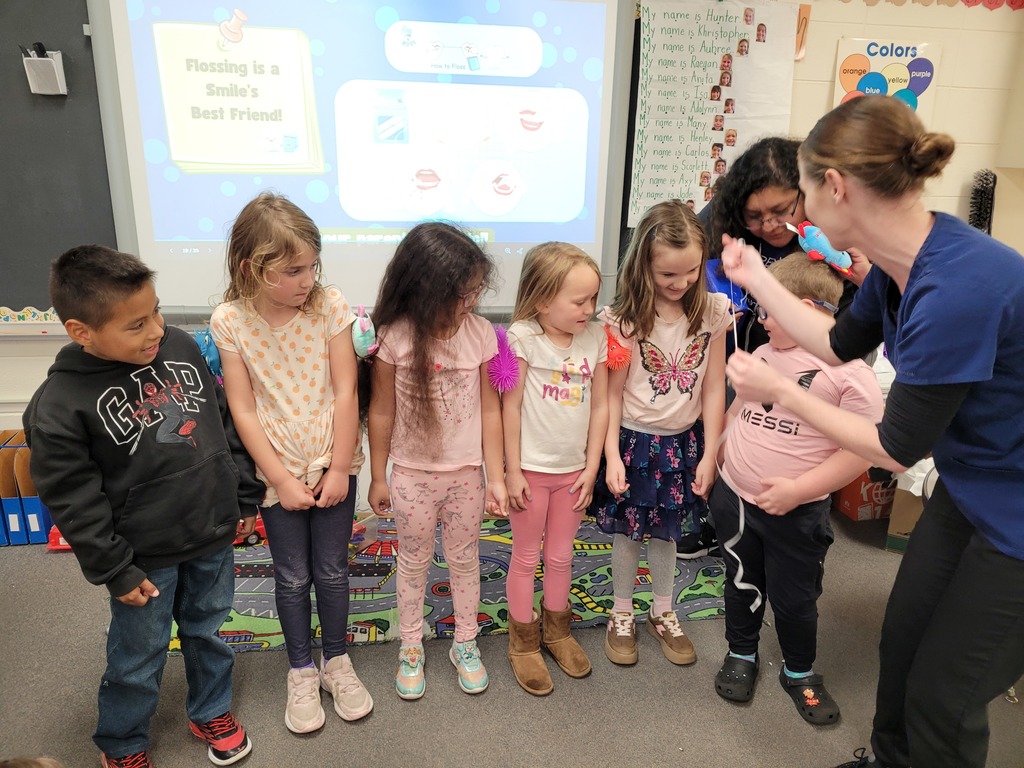 Flossing demonstration with students