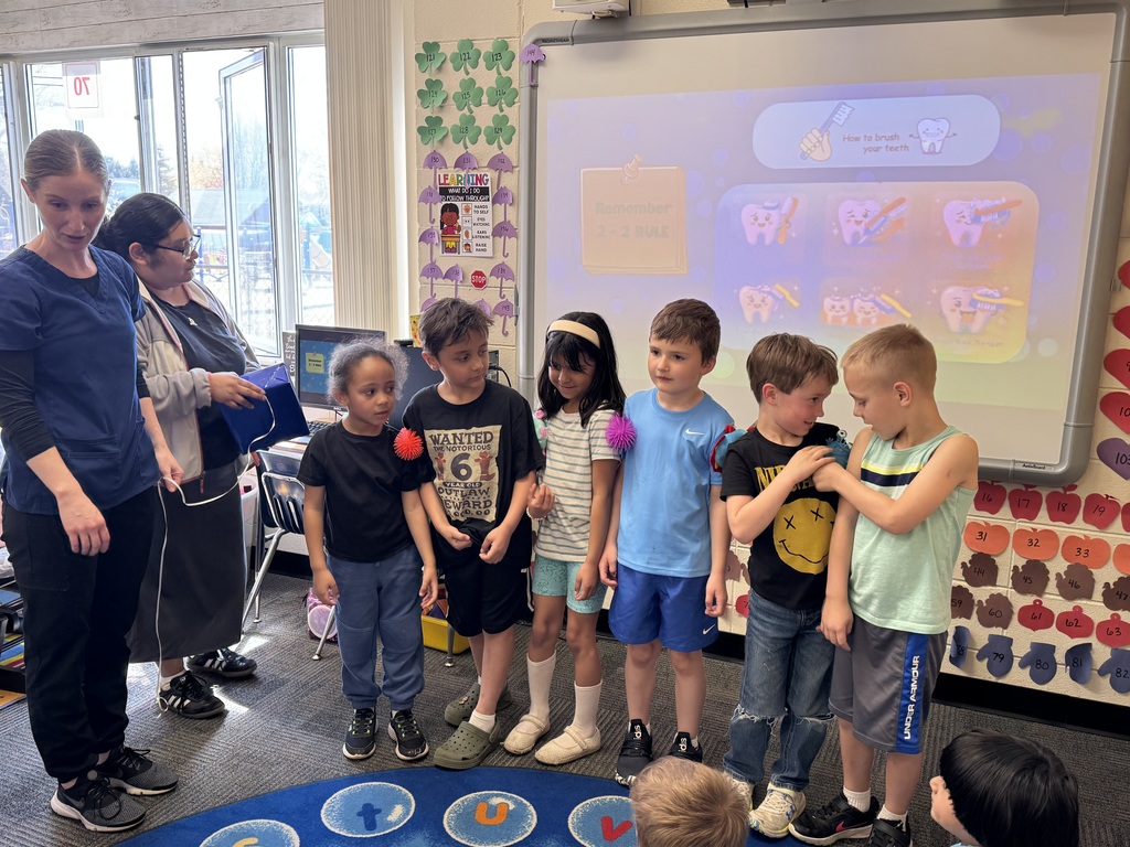Flossing demonstration with students