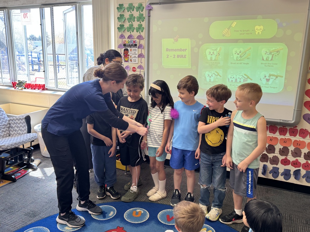 Flossing demonstration with students