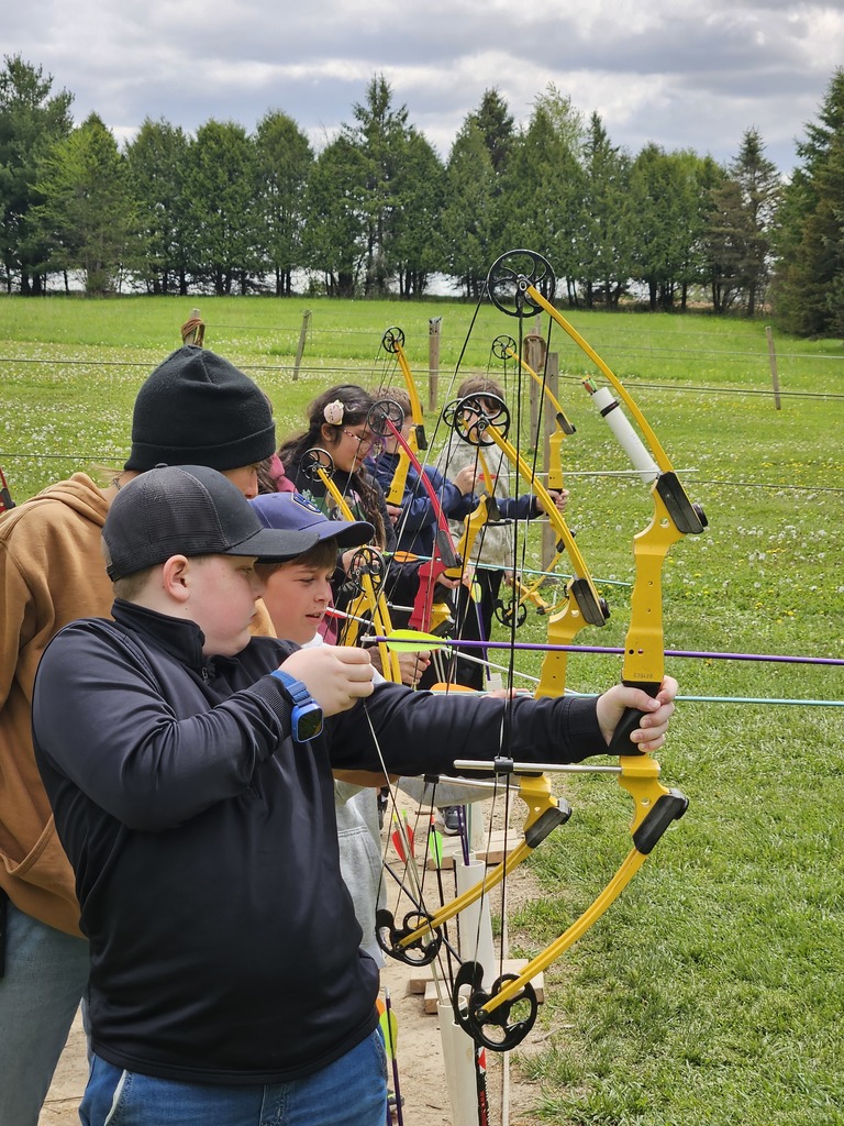 students practicing archary