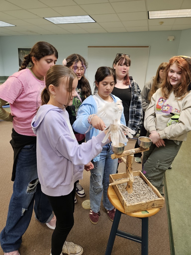 students with a bird