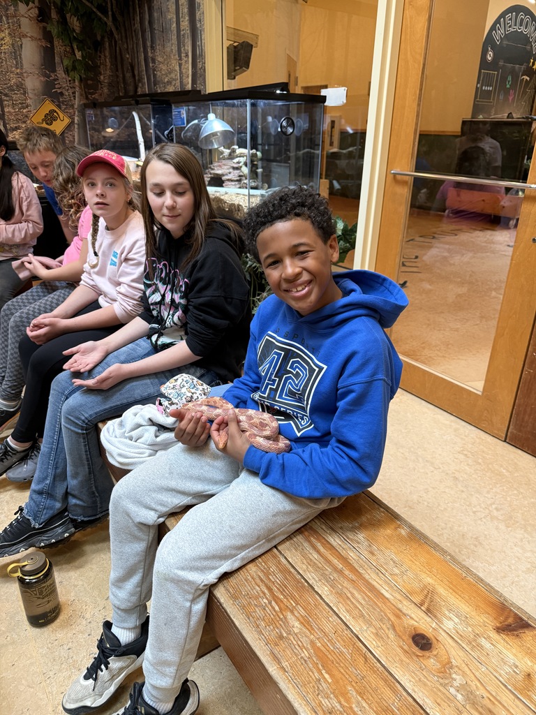 student with a snake