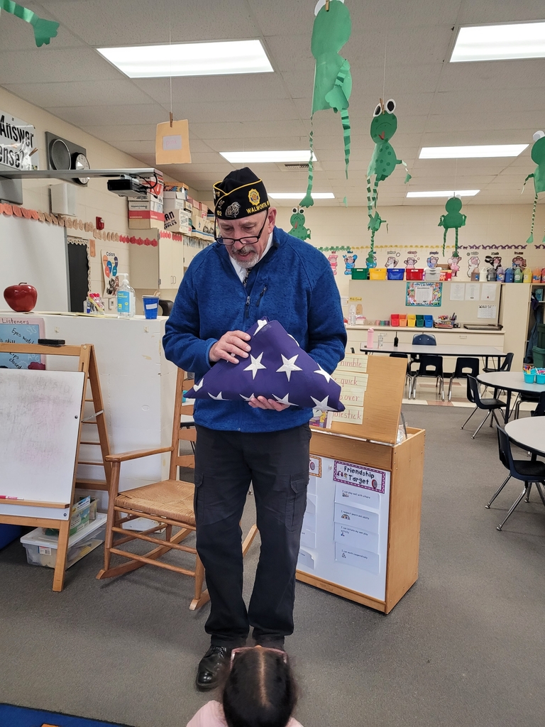 Mr. Kahl with folded flaf