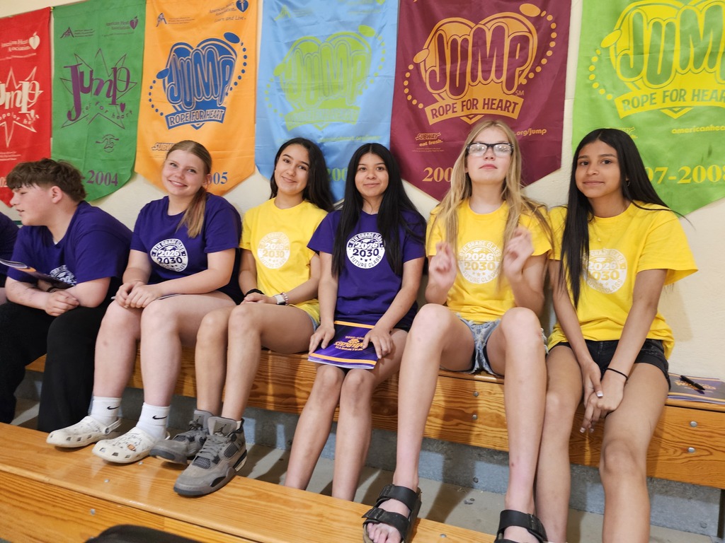 students and staff in the gym